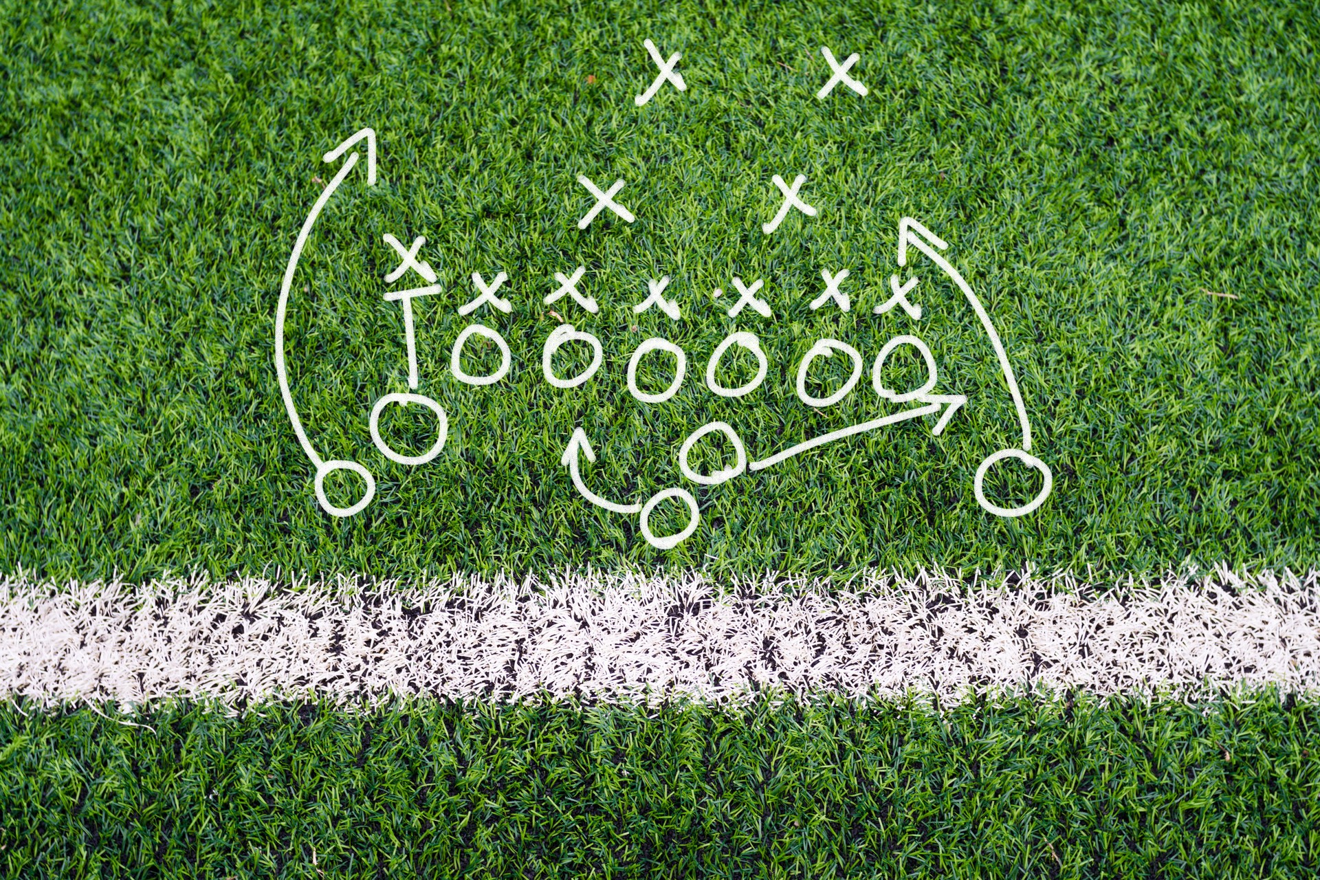 Planning graphic on soccer field grass